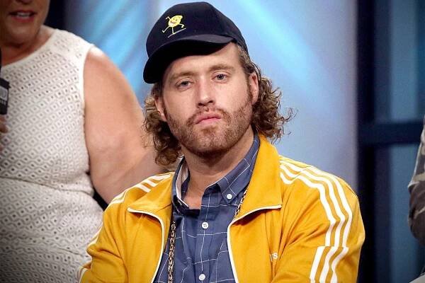 Image may contain T. J. Miller Human Person Clothing Apparel Skin Man and Face