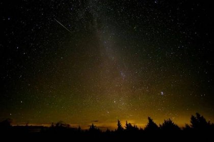 n this NASA handout, a 30 second exposure of a meteor streaks across the sky during the annual Perseid meteor shower August 12, 2016 in Spruce Knob, West Virginia. The annual display, known as the Perseid shower because the meteors appear to radiate from the constellation Perseus in the northeastern sky, is a result of Earth's orbit passing through debris from the comet Swift-Tuttle.