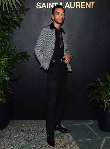 Justice Smith attends the SAINT LAURENT Pre-Oscars Event Hosted By Anthony Vaccarello on March 25, 2022 in Los Angeles, California.