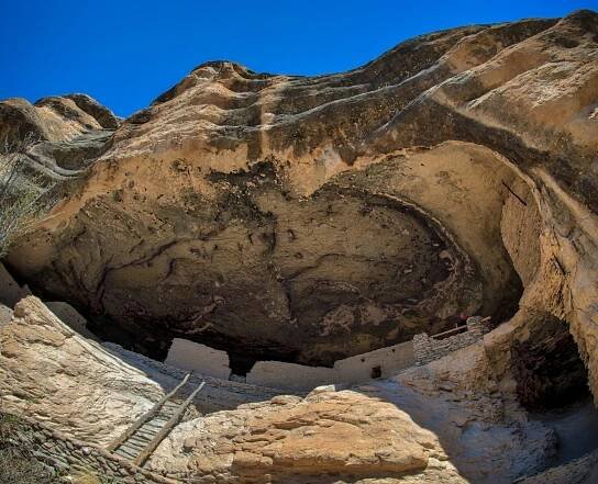 A fish-eye view looking up to the beautiful Gila Cliff Dwellings in Gila Cliff Dwellings National Monument near Silver City, New Mexico.