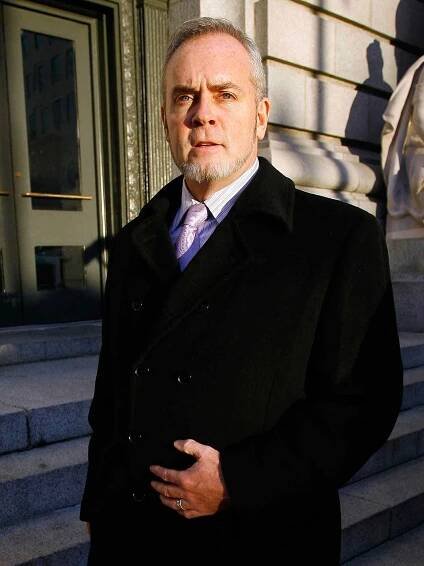Reality TV star Richard Hatch leaves federal court in Providence, R.I., Wednesday, Dec. 15, 2010. Hatch is charged of violating terms of his probation on his tax evasion sentence. (AP Photo/Stew Milne)