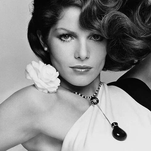 Lois Chiles in Halston dress and Elsa Peretti bottle pendant