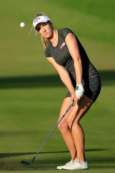 DUBAI, UNITED ARAB EMIRATES - DECEMBER 10: Paige Spiranac of the United States plays her third shot on the par 4, 14th hole during the second round of the 2015 Omega Dubai Ladies Masters on the Majlis Course at The Emirates Golf Club on December 10, 2015 in Dubai, United Arab Emirates.