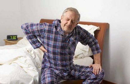 An older man with back pain