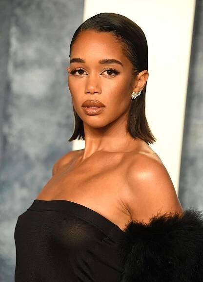 Laura Harrier with a slicked-back blunt haircut