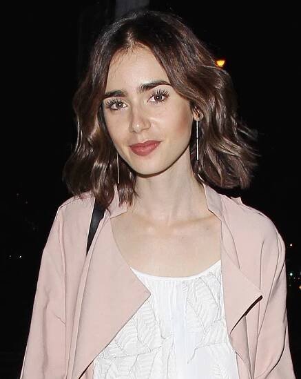 Lily Collins looks lovely as she leaves dinner at Catch LA