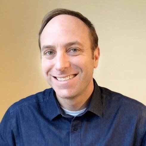 Headshot of Daniel Etra
