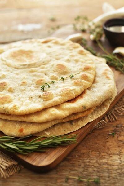 Stack of our healthy vegan flatbreads made with garlic and herbs