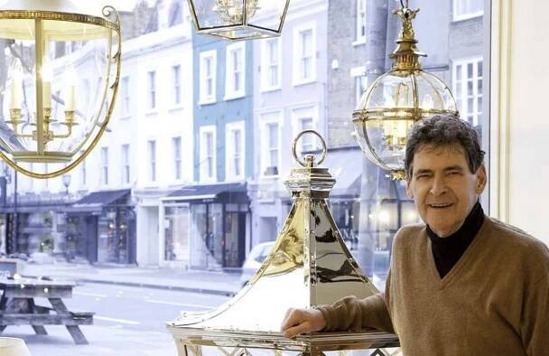 Charles Edwards sitting in the King's Road Showroom window