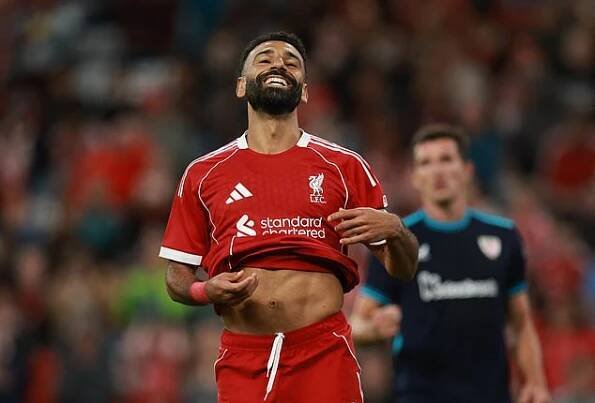 Soccer Football - Friendly - Liverpool v Athletic Bilbao - Anfield, Liverpool, Britain - August 4, 2025 Liverpool's Mohamed Salah reacts after missing a penalty REUTERS/Phil Noble