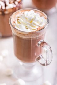 Slow Cooker Hot Chocolate is a decadent, creamy drink made with heavy cream, cocoa, vanilla, and chocolate chips. Perfect holiday dessert to serve a crowd at your next Christmas party!