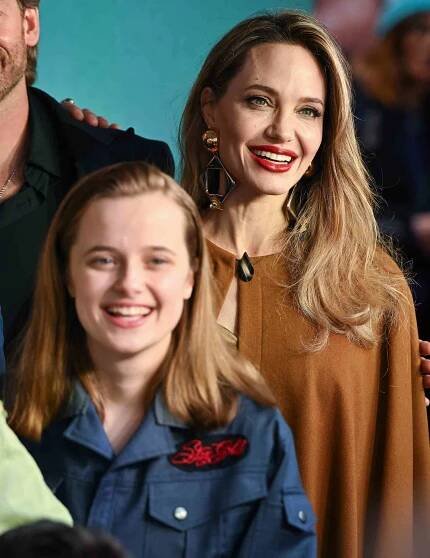  Vivienne Jolie-Pitt and Angelina Jolie attend the opening night of "The Outsiders" 