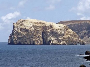 Boatswain Bird Island with natural arch - one of the wonders of Ascension Island