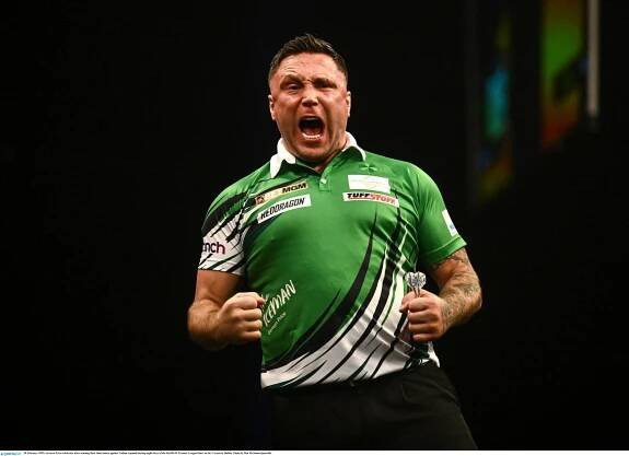 20 February 2025; Gerwyn Price celebrates after winning their final match against Nathan Aspinall during night three of the BetMGM Premier League Darts at the 3 Arena in Dublin. Photo by Ben McShane/Sportsfile
