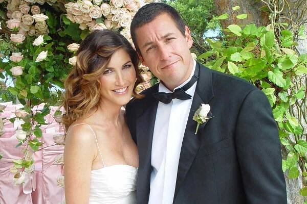  Adam Sandler poses with his bride model-actress Jackie Titone at their wedding June 22, 2003 in Malibu, California.