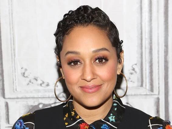 Tia Mowry Shared a Throwback Photo of Herself Wearing a Side Ponytail — See Photos