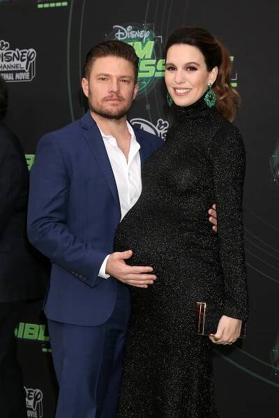 Brendan Rooney and Christy Carlson Romano at the "Kim Possible" premiere in 2019
