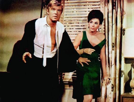P.J., from left: George Peppard, Susan Saint James, 1968.
