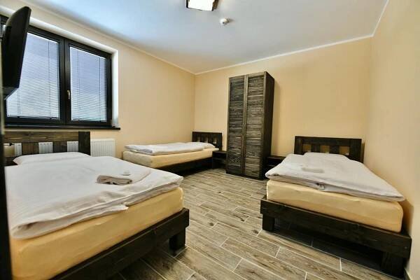 Postel nebo postele na pokoji v ubytování Wellness Hotel Fridrich + 52 fotografií