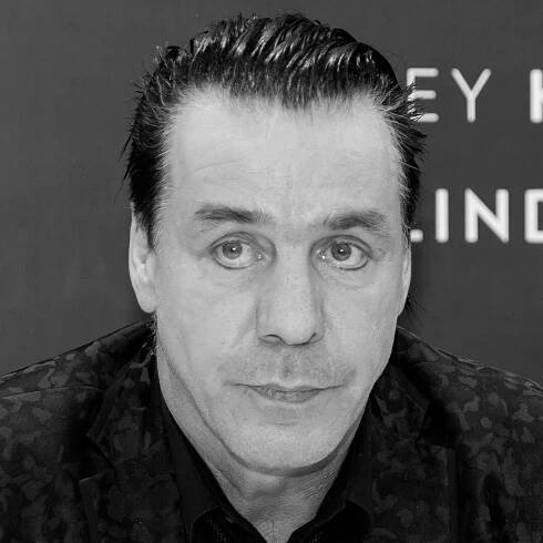 A black and white photo of Till Lindemann looking sad.
