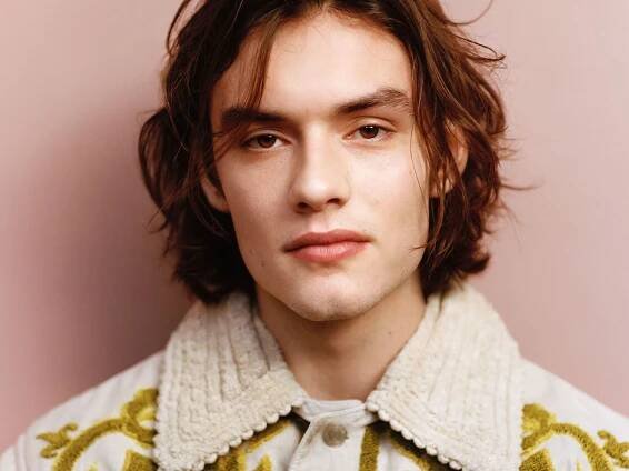 “If There’s Loads Of People Nattering About You, You Can Choose To Listen – Or Not”: Louis Partridge On Prada, Paparazzi & Putting It All On The Line For His Craft