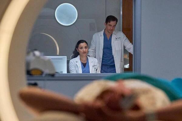 Jon-Michael Ecker and Anya Banerjee in Doc (2025)