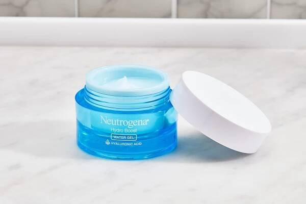 Neutrogena Hydro Boost Water Gel with Hyaluronic Acid displayed on marble countertop
