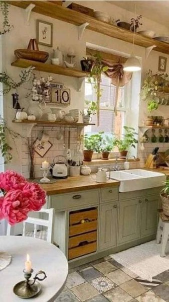 Green Cupboards and White Dishes for a Modern Kitchen