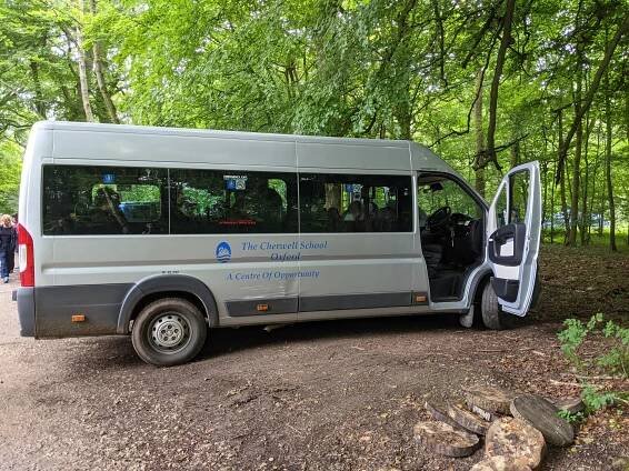 School minibus arrives at the chalet at Wytham Woods