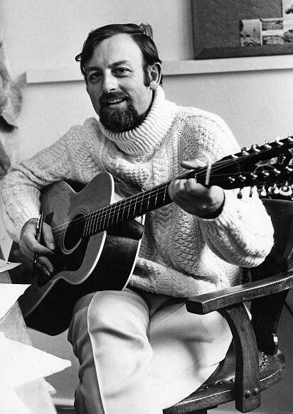 Portrait of musician Roger Whittaker with his guitar, October 22nd 1970. 