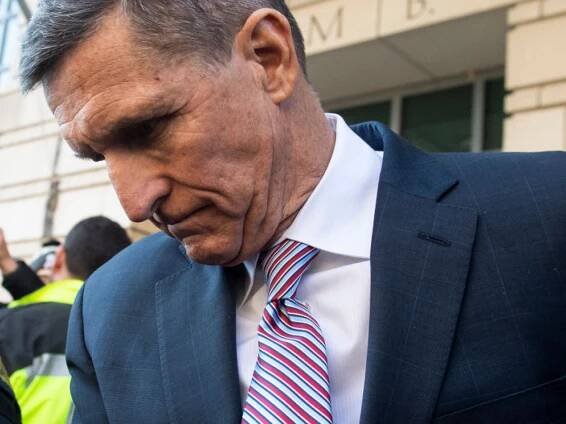 Twitter bans prominent QAnon figures, including Michael Flynn, citing 'potential for violence'