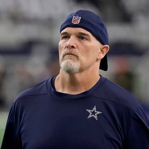 Washington Commanders hiring Dallas Cowboys defensive coordinator Dan Quinn as coach, AP sources say