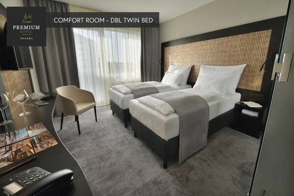 Postel nebo postele na pokoji v ubytování PREMIUM Wellness & Wine Hotel Znojmo
