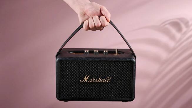 Person holding the Marshall Kilburn III