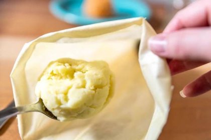 Mashed potatoes placed in piping bag for frosting