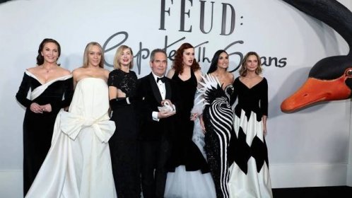 The Feud cast from left to right: Diane Lane, Chloe Sevigny, Naomi Watts, Tom Hollander, Molly Ringwald, Demi Moore and Calista Flockhart. Picture: Dimitrios Kambouris/Getty Images