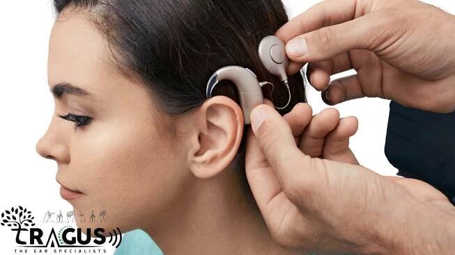 Despite the benefits of cochlear implants, some people with hearing loss choose to turn them off?