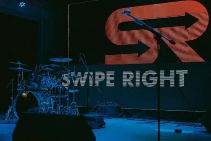 Swipe Right band onstage playing an event