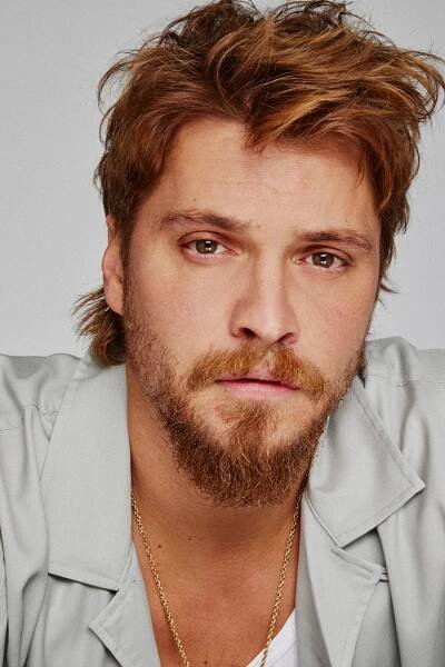portrait of luke grimes looking at you