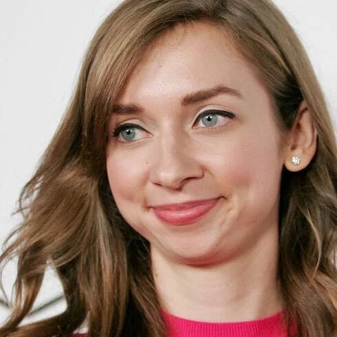 Lauren Lapkus brightens her blue sofa with an unexpected, joyful accessory – and it's hiding on Wayfair for...