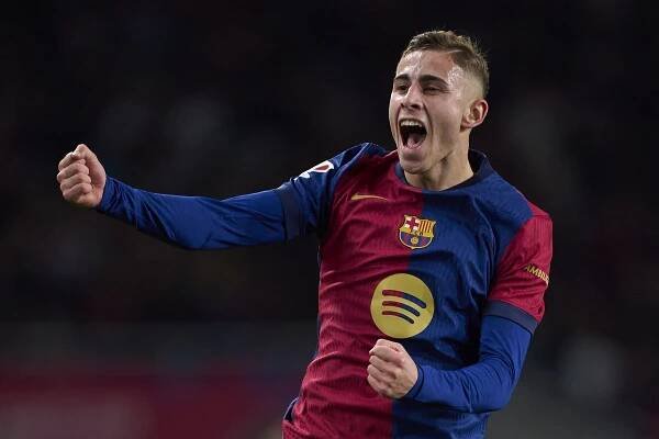 Fermin Lopez celebrates after scoring Barcelona's fourth goal against Valencia in La Liga in January 2025.