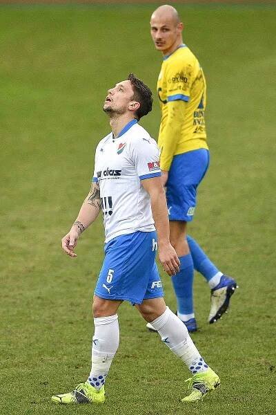 Utkání 21. kola první fotbalové ligy: FC Baník Ostrava – FK Teplice, 27 února 2021 v Ostravě. (zleva) Adam Jánoš z Ostravy a Tomáš Kučera z Teplic.
