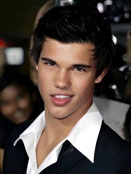 a close up of a person wearing a black suit and white shirt with dark hair
