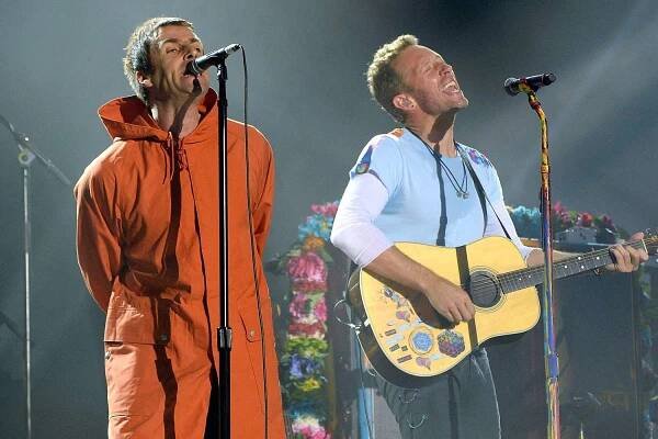 Chris Martin thanks Noel Gallagher for being at Manchester benefit concert 'in spirit'
