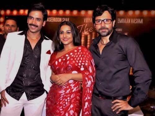 Vidya Balan is posing with co-stars