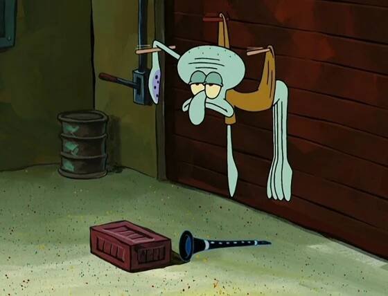 Squidward Tentacles, a cartoon character, is hanging by his arms and looking dejectedly at a clarinet on the ground