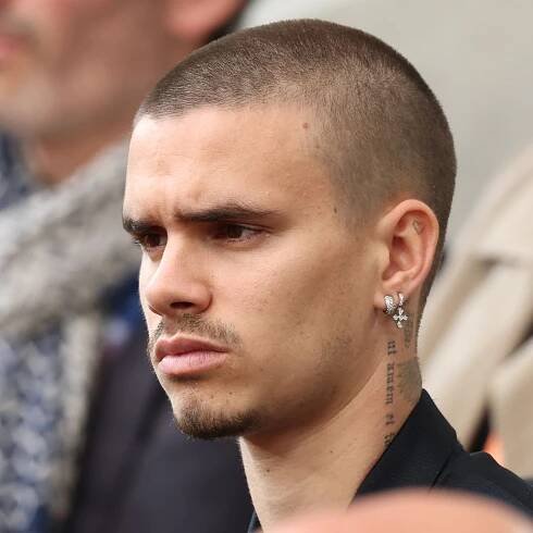 Romeo Beckham's new tattoo raises eyebrows amid talk of Brooklyn rift