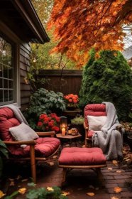 a patio set with chairs and an ottoman in fall