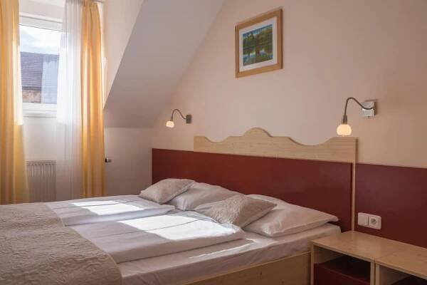 Posteľ alebo postele v izbe v ubytovaní Wellness Hotel IRIS