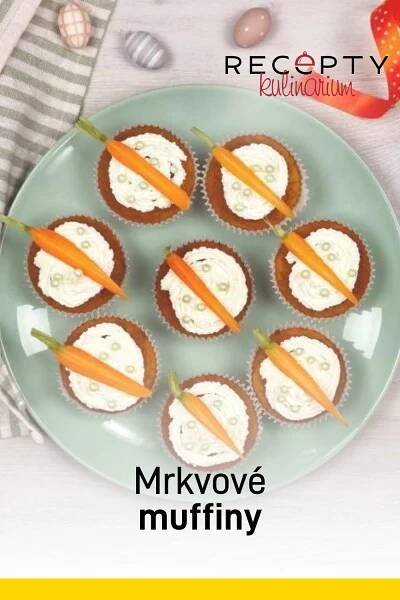 cupcakes are arranged on a plate with carrot sticks
